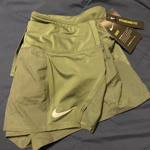 Green Nike shorts